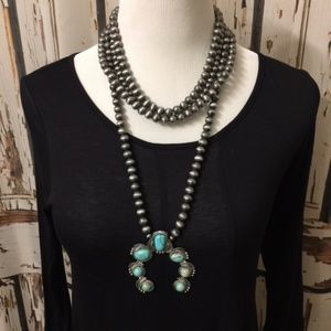 A Turquoise Squash Blossom Necklace Navajo Style